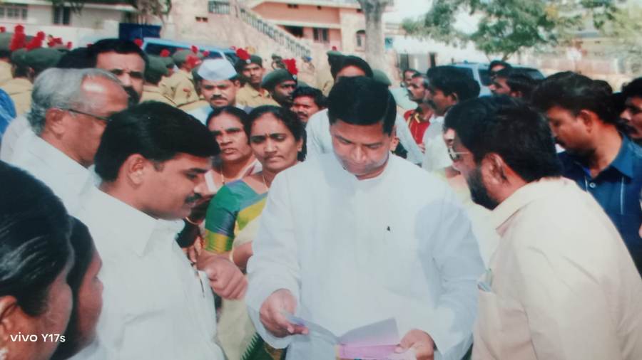 Presenting an NSUI poster to Minister Chinna Reddy